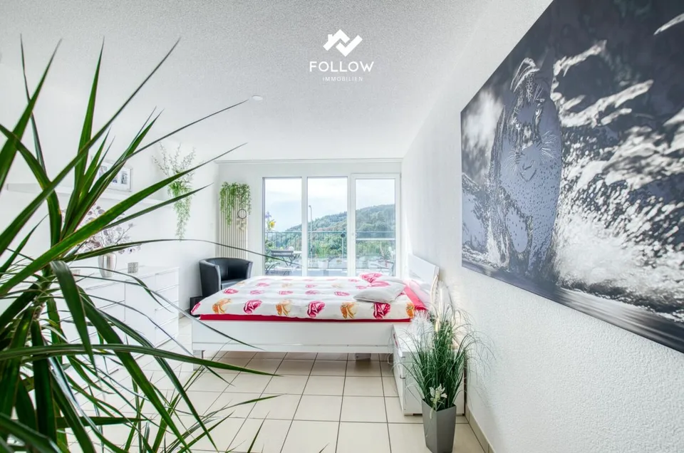 Panoramablick über den Bielersee: Modernisierte Attika-Traumwohnung in Twann – Foto 12 von 23