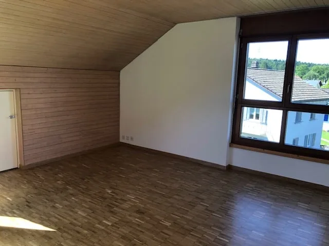 2.5-room attic apartment in a green area with a lot of charm
