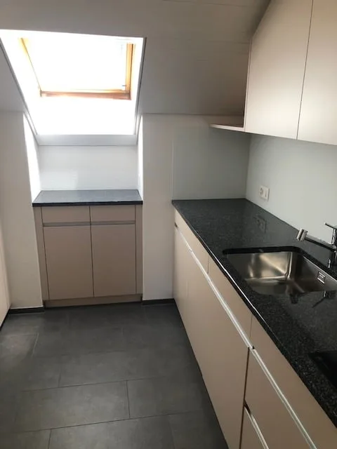 2.5-room attic apartment in a green area with a lot of charm