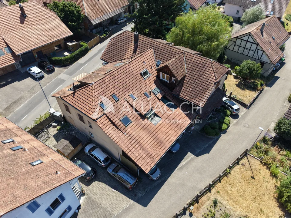 Maison multifamiliale polyvalente dans un quartier calme – photo 5 sur 13