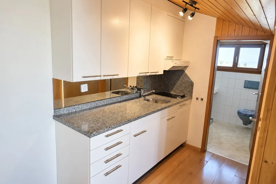 Appartamento mansardato di 2,5 locali confortevole con bella vista a Uetliburg