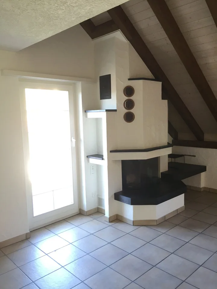 Appartamento di 6,5 locali mansardato in una casa con molto charme