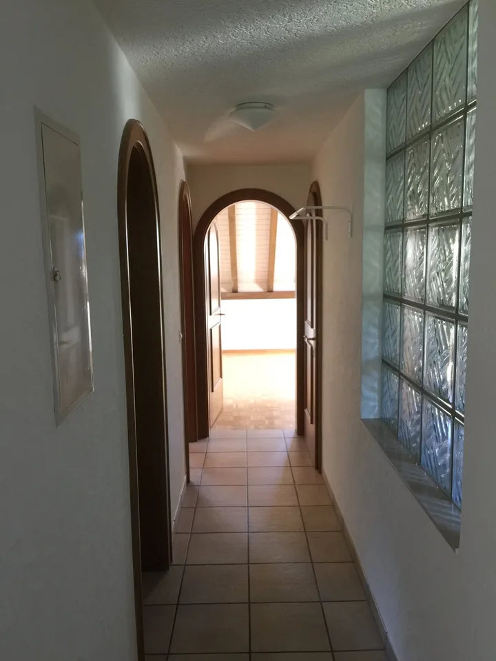 Appartamento di 6,5 locali mansardato in una casa con molto charme