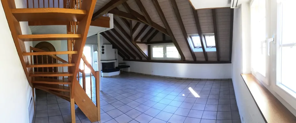 Appartamento di 6,5 locali mansardato in una casa con molto charme