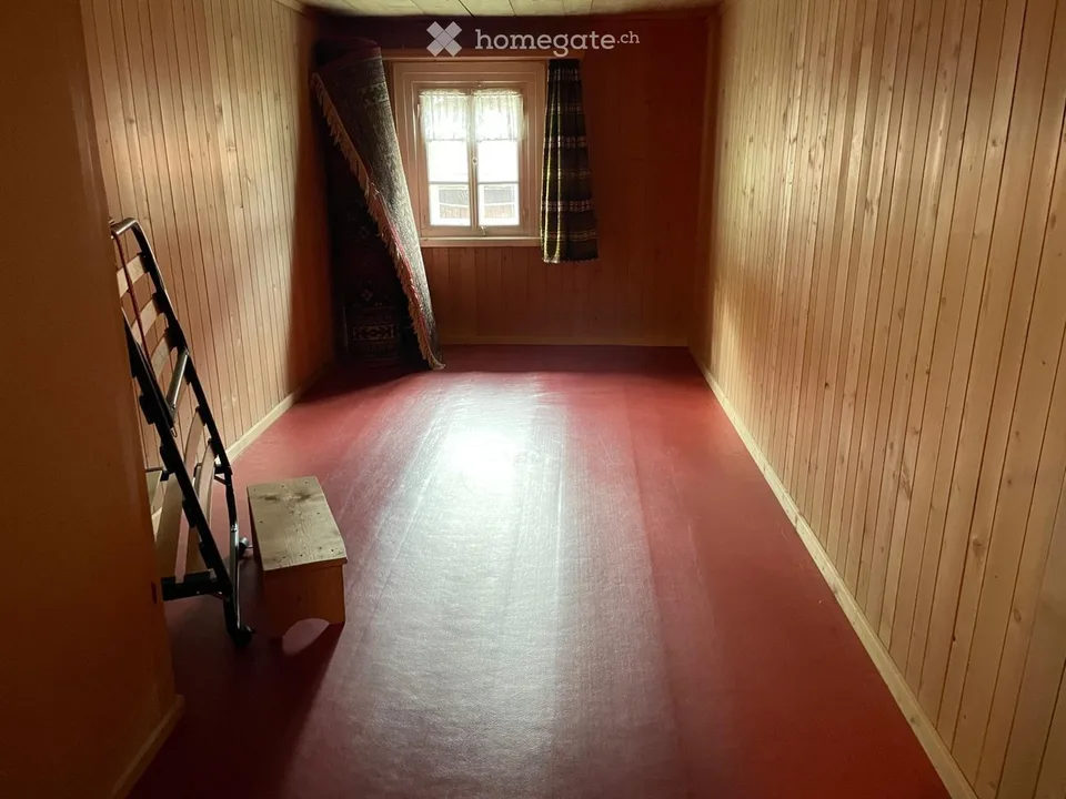 Charmante Bauernhaushälfte mit Garten und Schopf in Rueras, Graubünden