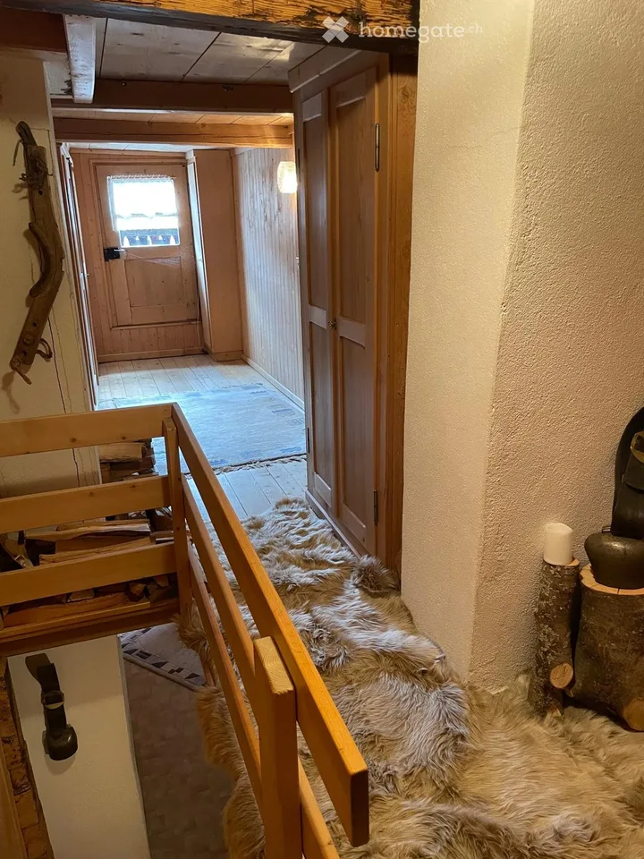 Charmante Bauernhaushälfte mit Garten und Schopf in Rueras, Graubünden
