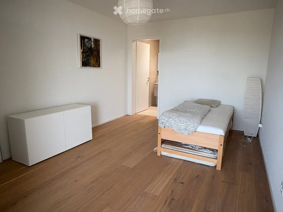 Appartamento di 2.5 locali con balcone a Bussigny