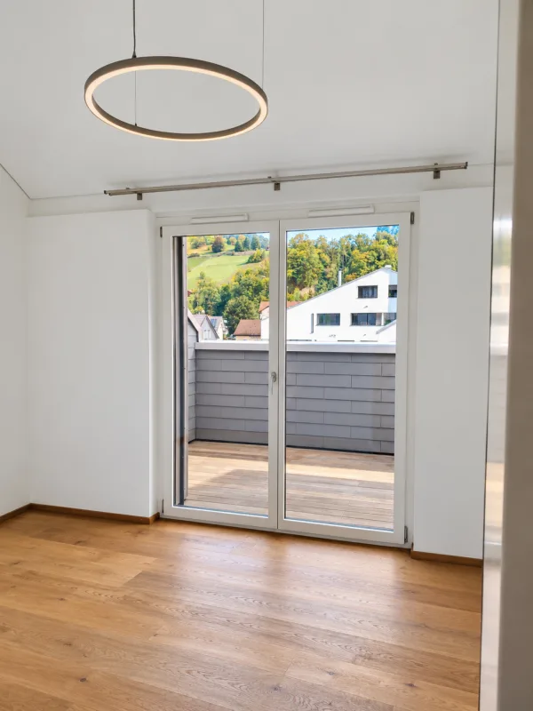 Appartement moderne 3,5 pièces avec étage galerie et place de parking souterrain incluse
