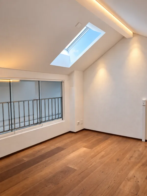 Appartement moderne 3,5 pièces avec étage galerie et place de parking souterrain incluse