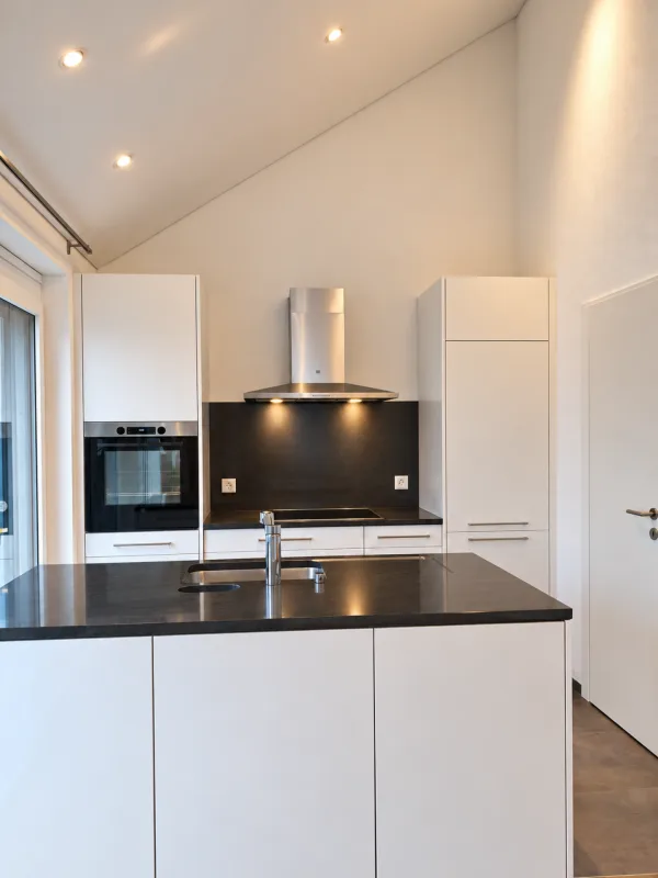 Appartement moderne 3,5 pièces avec étage galerie et place de parking souterrain incluse