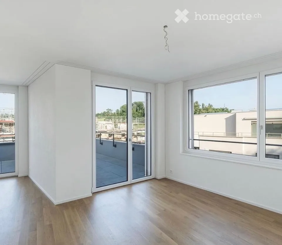 Appartamento attico moderno di 2,5 locali in un edificio nuovo