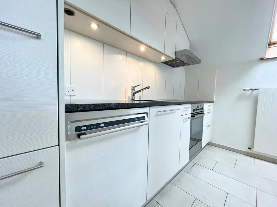 Moderne Dachwohnung an zentraler & ruhiger Lage