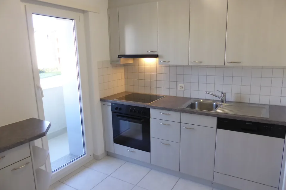 3-bedroom apartment with a view of the green
