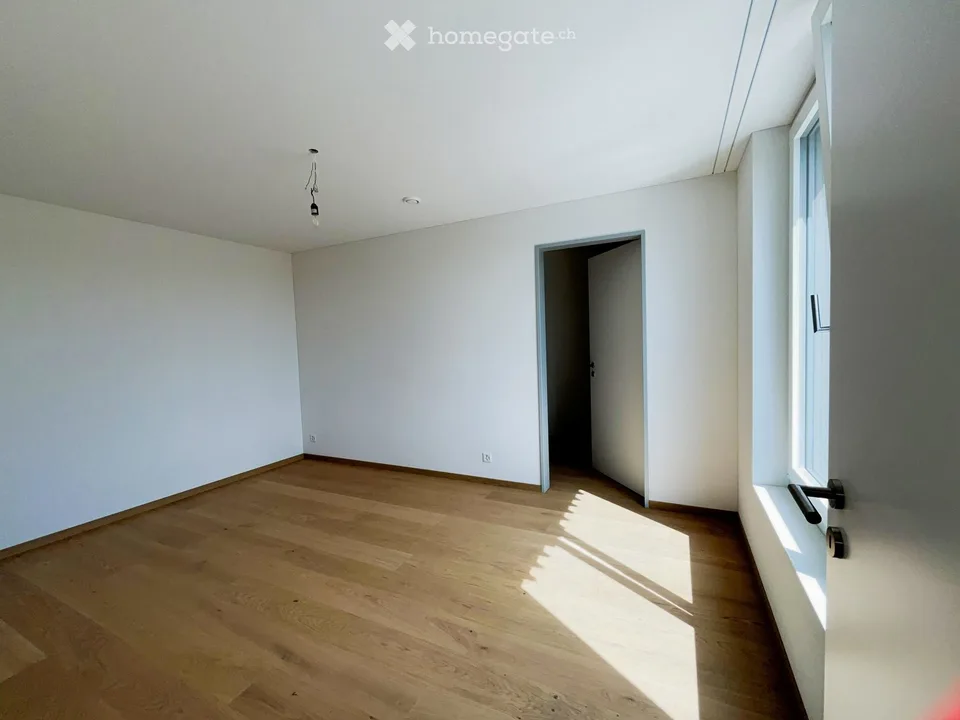Appartamento moderno semidetachato di 2,5 locali con balcone coperto e piccolo spazio giardino