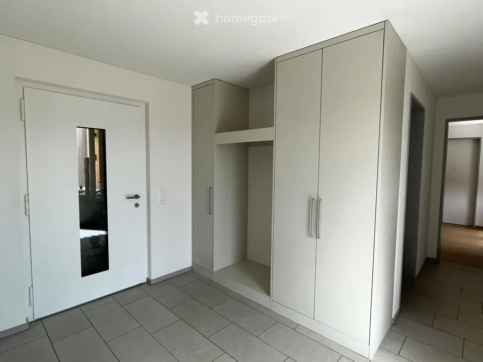 Appartamento moderno semidetachato di 2,5 locali con balcone coperto e piccolo spazio giardino