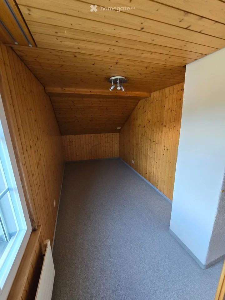 Charming 3-room attic apartment in the heart of the village center for rent