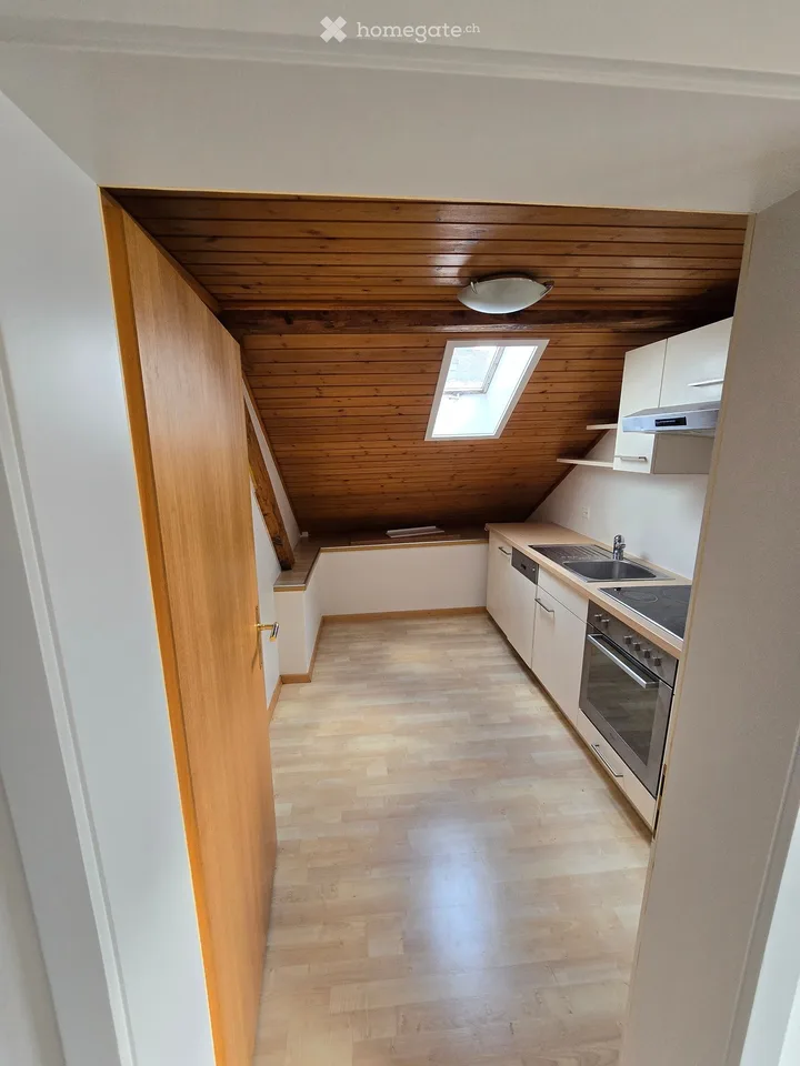 Charming 3-room attic apartment in the heart of the village center for rent