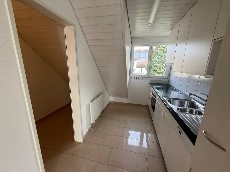 Modern 3-room attic apartment with balcony in Wettingen
