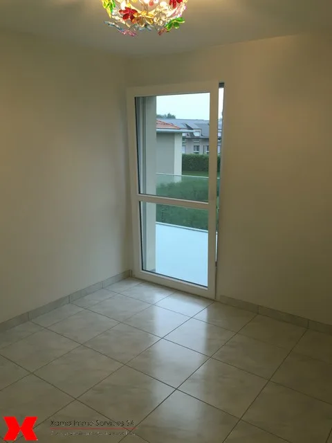 Spacieux appartement de 5.5 pièces avec balcon au 1er étage