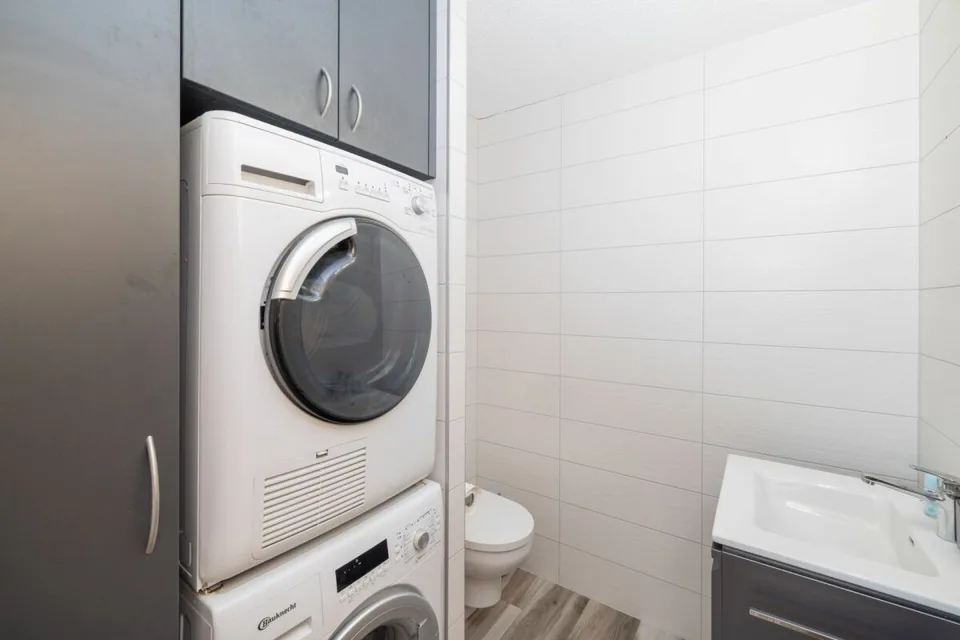 Spacieux 3 pièces 1/2 en rez-de-jardin de 107 m² – photo 16 sur 32