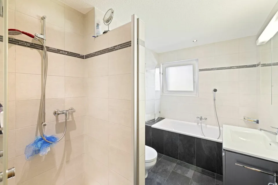 Spacieux 3 pièces 1/2 en rez-de-jardin de 107 m² – photo 15 sur 32