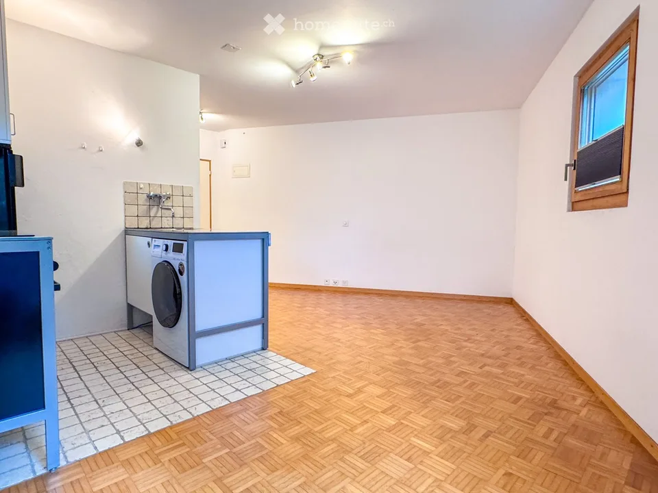 Charmante 1-Zimmer-Wohnung mit Gartensitzplatz und PP in Igis
