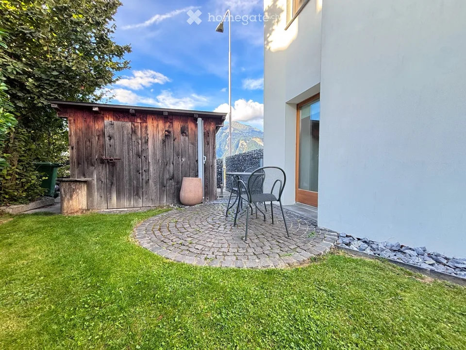 Charmante 1-Zimmer-Wohnung mit Gartensitzplatz und PP in Igis