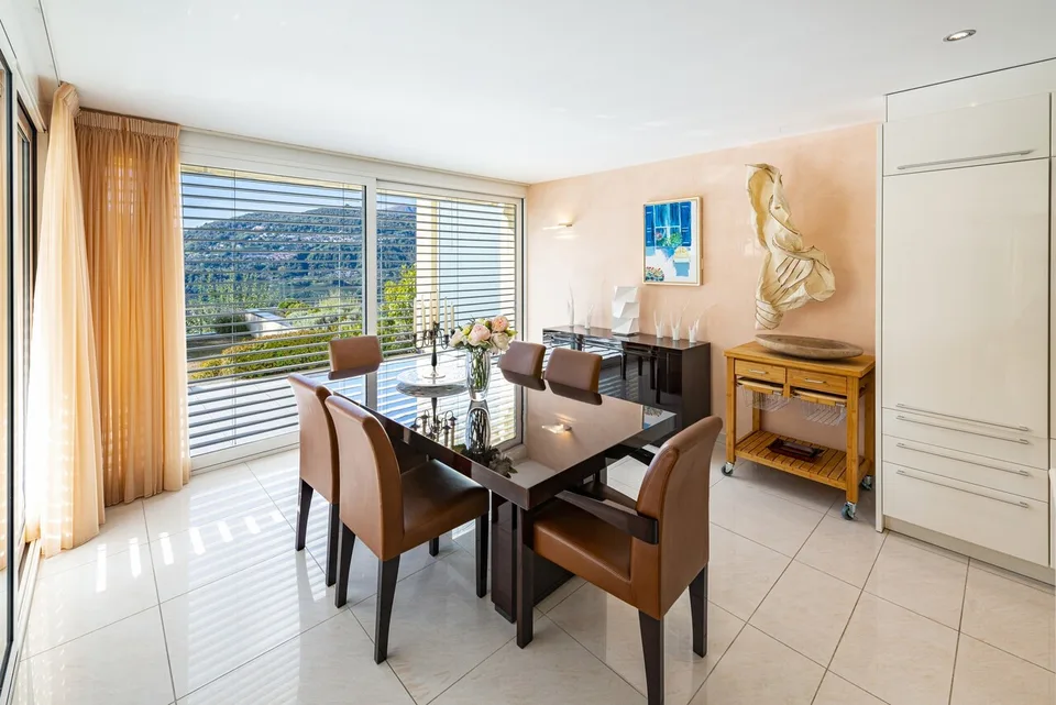 Elegante appartamento con giardino e vista lago, a due passi dal TASIS – Foto 9 von 13