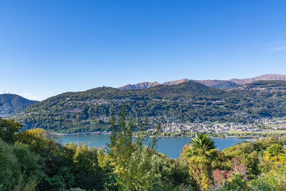 Elegante appartamento con giardino e vista lago, a due passi dal TASIS – Foto 7 von 13