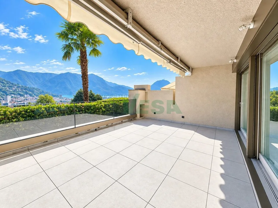 Moderno e luminoso appartamento 2 locali con splendida vista lago – Foto 2 von 11