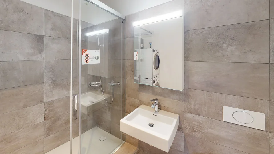 Appartement 1 pièce moderne dans le populaire Grimselhof - Confort & Design – photo 4 sur 5
