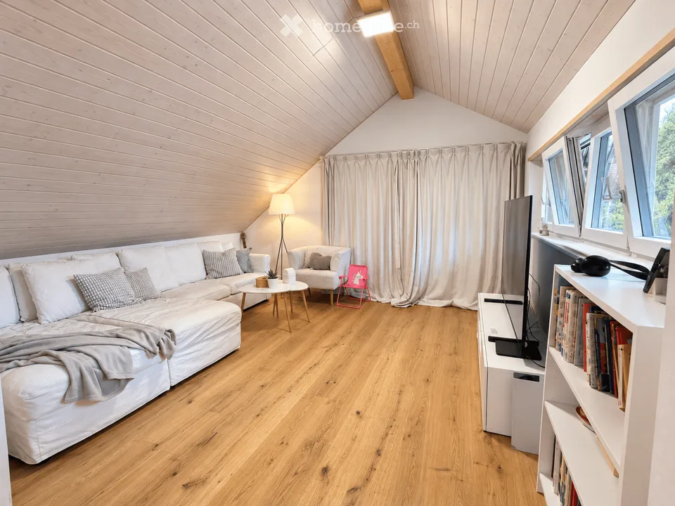 Appartement en duplex de 4,5 pièces avec loggia et part de jardin