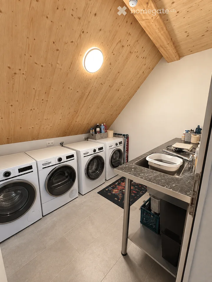 Appartement en duplex de 4,5 pièces avec loggia et part de jardin