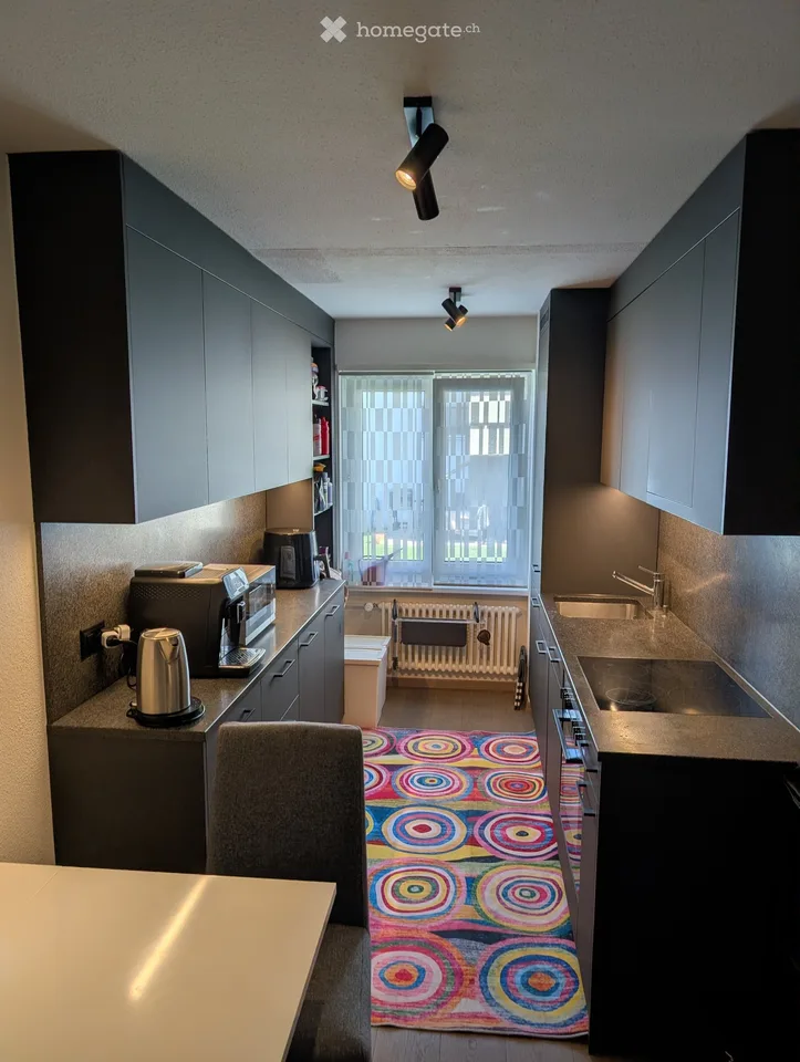Modern living in Kloten: Well-kept ground floor apartment with garden seating area