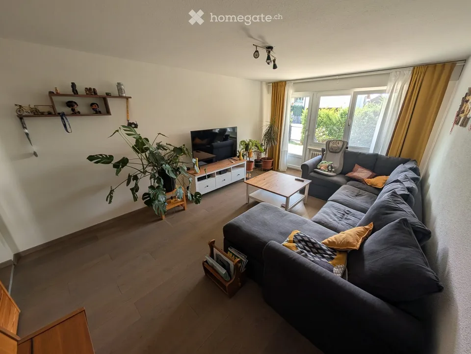 Modern living in Kloten: Well-kept ground floor apartment with garden seating area