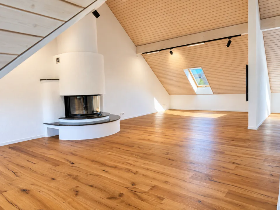 Exclusive 5.5-room attic apartment with approx. 160 m² - direct lift access, fireplace & 4 underground parking spaces – photo 2 of 15