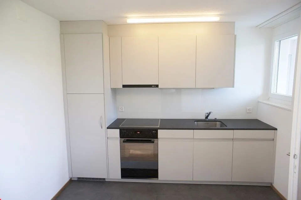 Top modern apartment with balcony in the center!