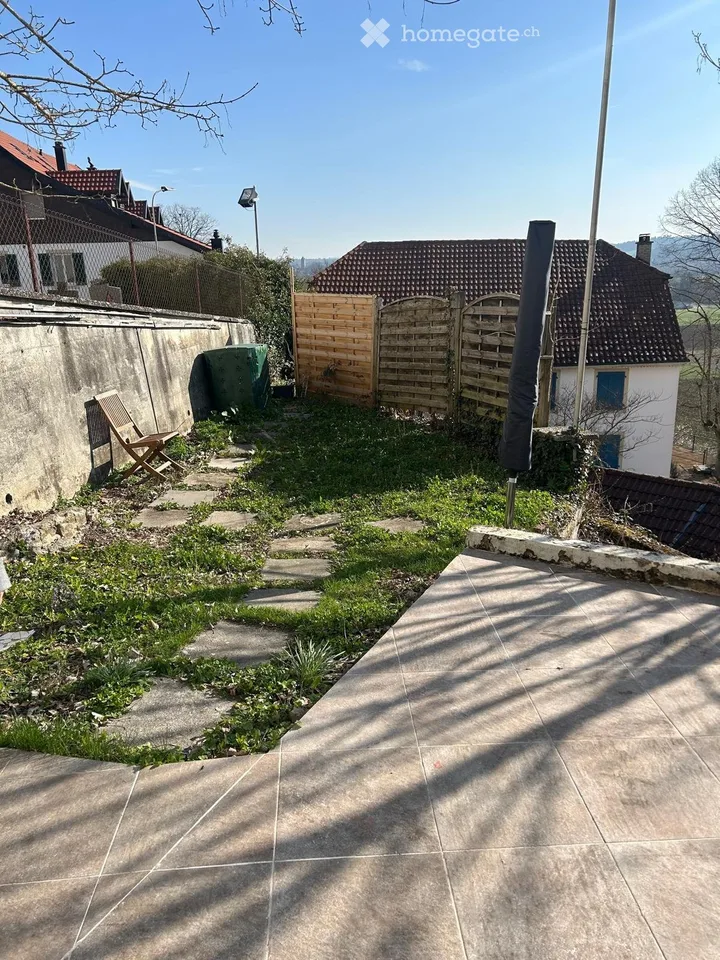 Vier-Zimmer-Wohnung mit Terrasse und Garten in Courtedoux