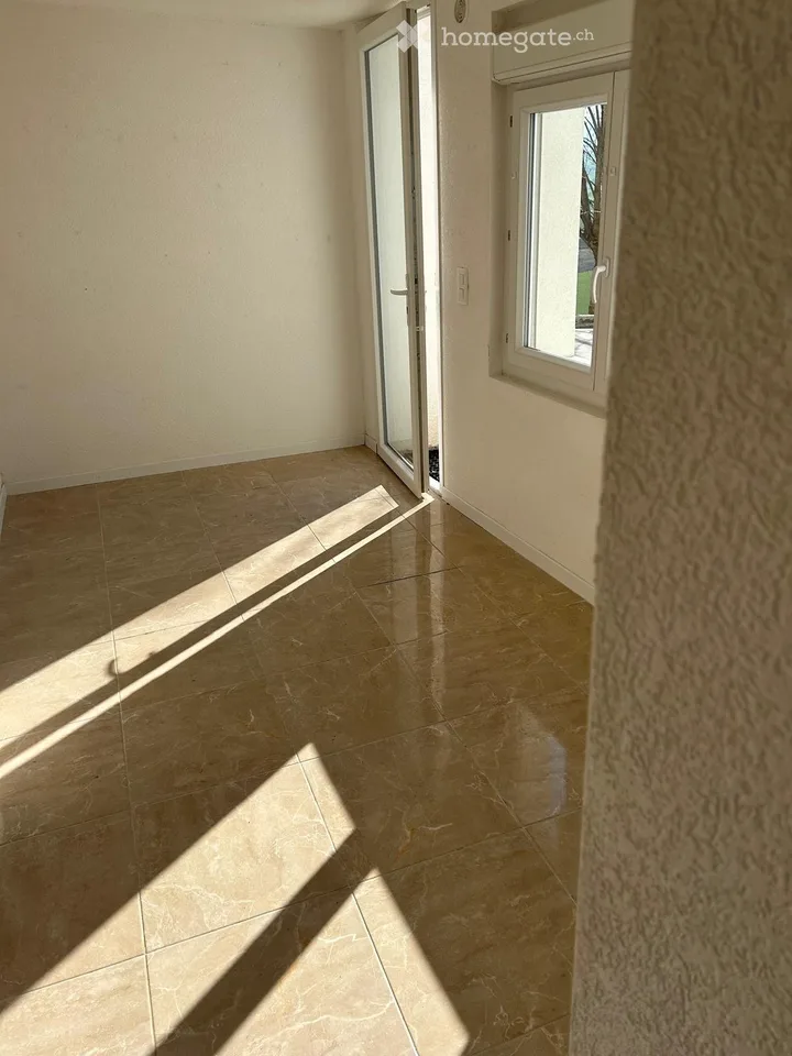 Vier-Zimmer-Wohnung mit Terrasse und Garten in Courtedoux