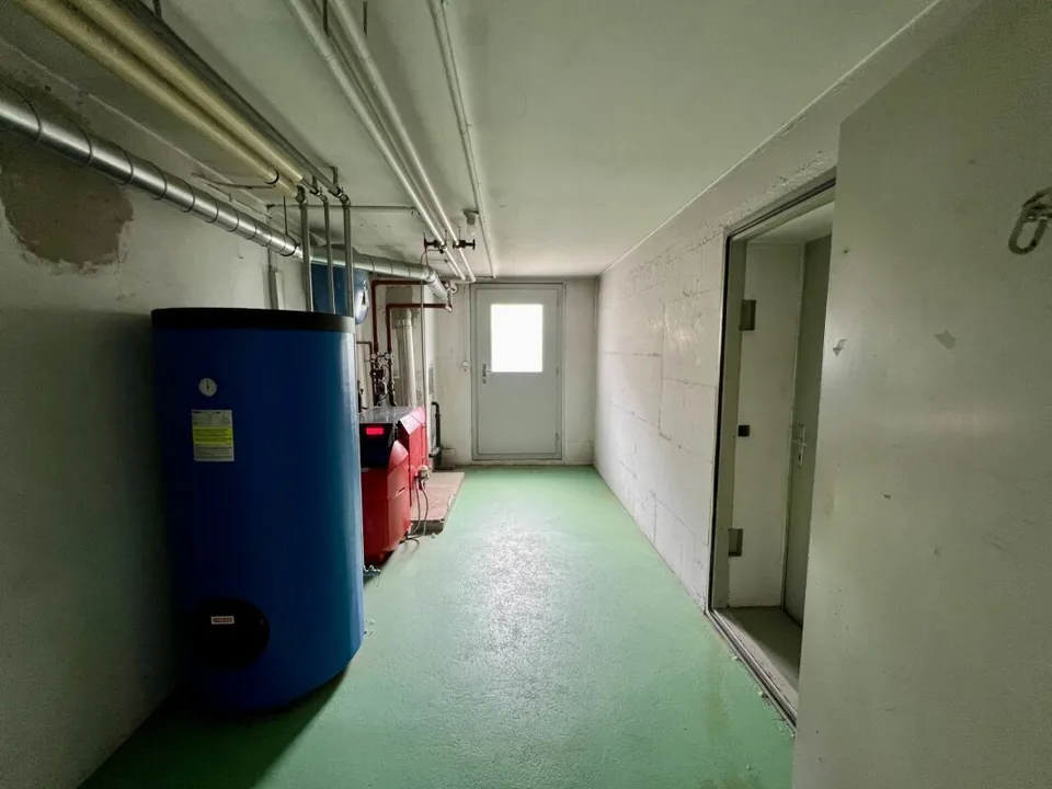 Maison multifamiliale entièrement louée avec trois grands appartements – photo 13 sur 13