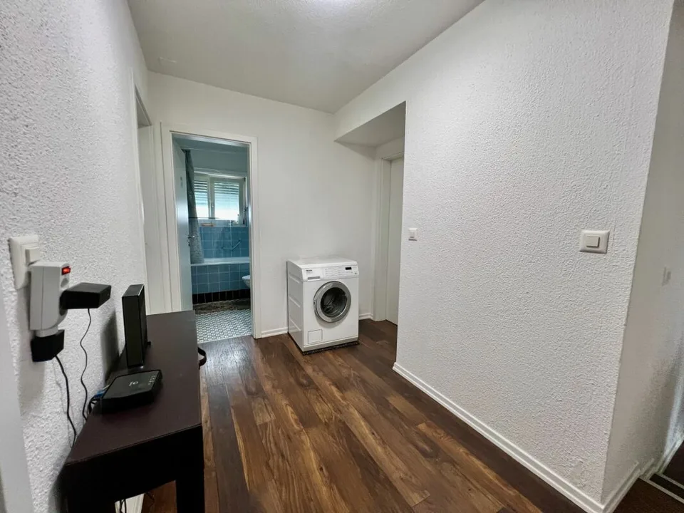 Maison multifamiliale entièrement louée avec trois grands appartements – photo 7 sur 13