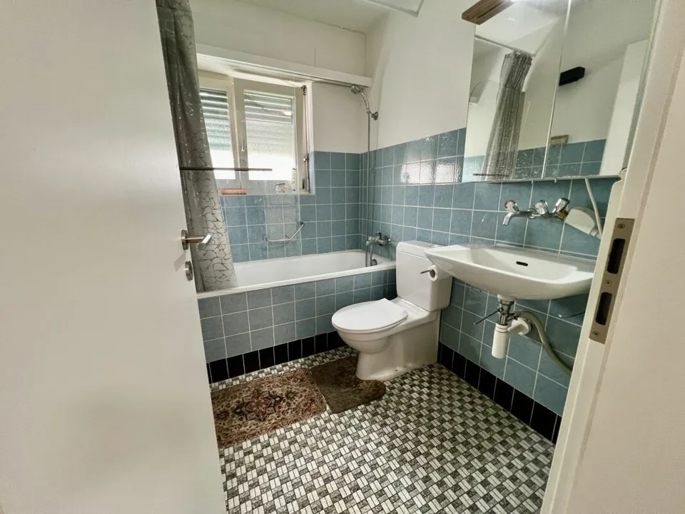 Maison multifamiliale entièrement louée avec trois grands appartements – photo 6 sur 13