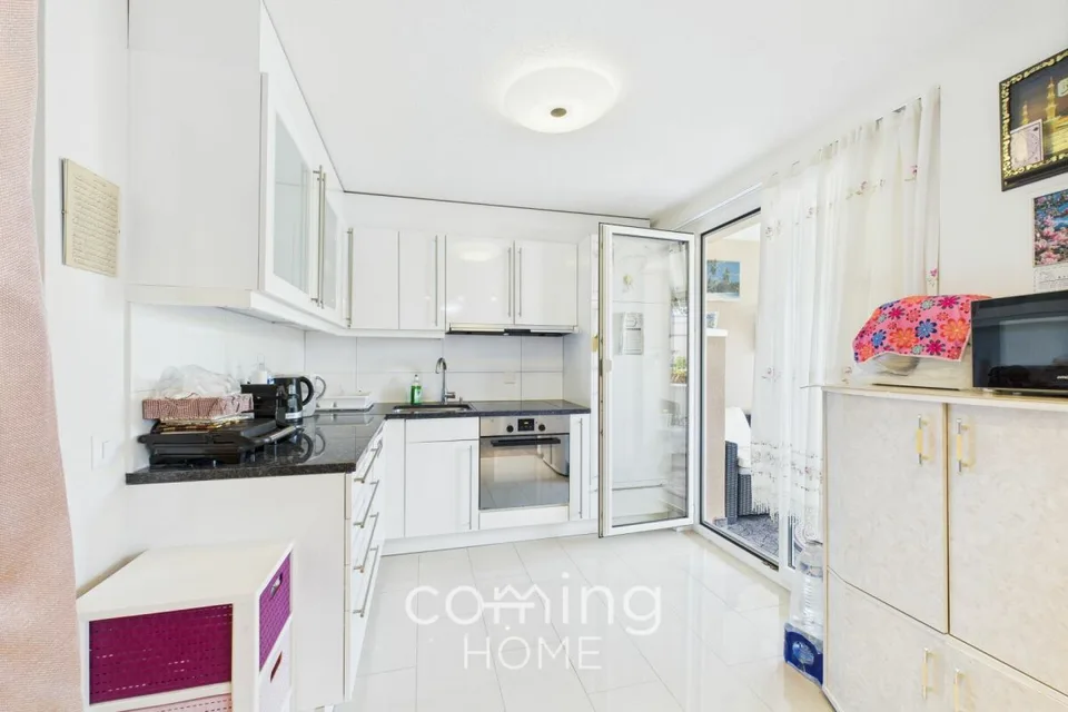 Appartement de 3,5 pièces à Reinach - garage, aire de jeux et quartier familial et calme – photo 4 sur 12