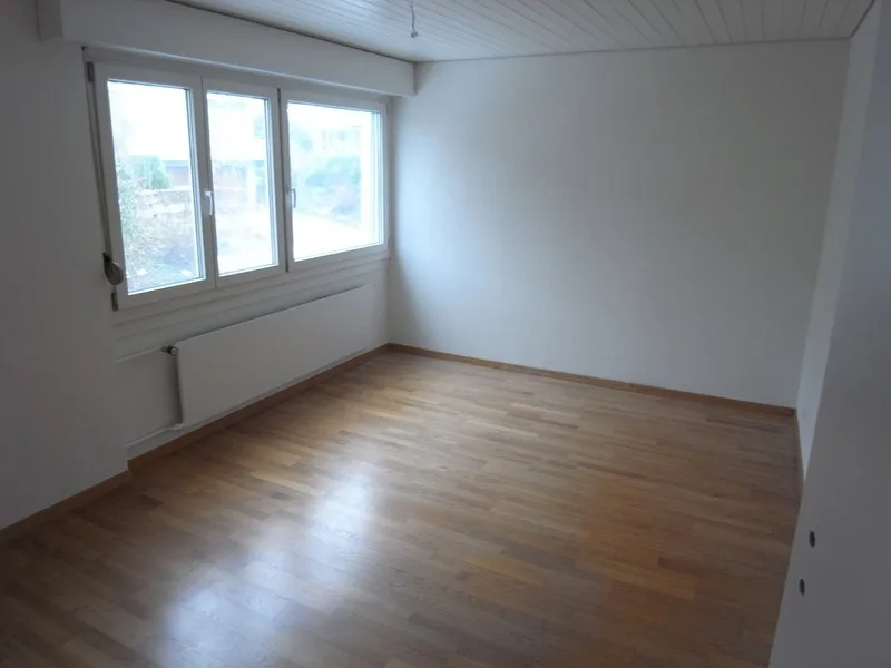 Row house with garden, garage, and hobby room