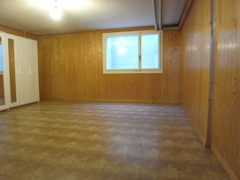 Row house with garden, garage, and hobby room