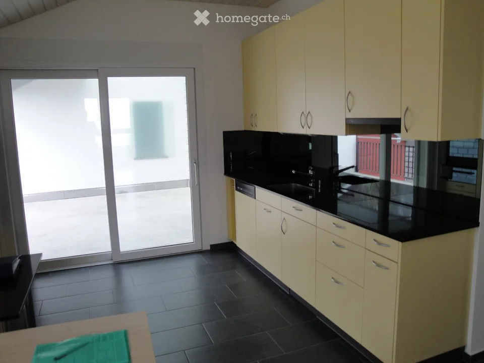 Charmante 3.5-Zimmer-Dachwohnung mit Balkon in Mühlau