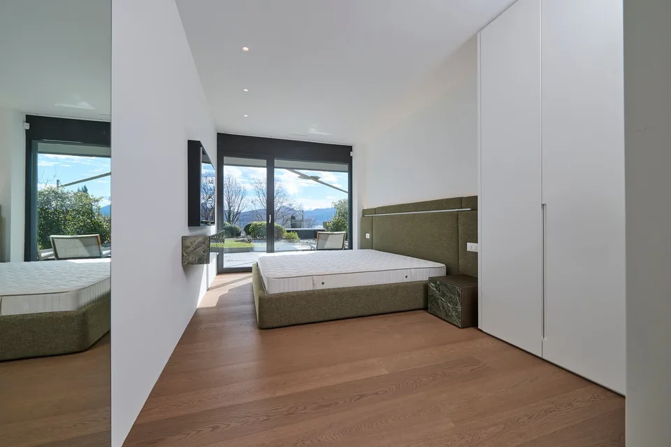 LIBELLULA RESIDENCE: Stupendo appartamento con enorme giardino e vista lago – Foto 8 von 16