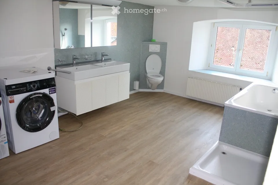 Brightly renovated 4.5-room apartment with its own house part and large garden in Sennwald