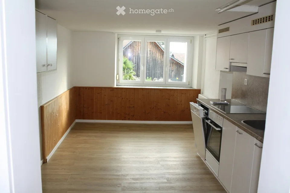 Brightly renovated 4.5-room apartment with its own house part and large garden in Sennwald