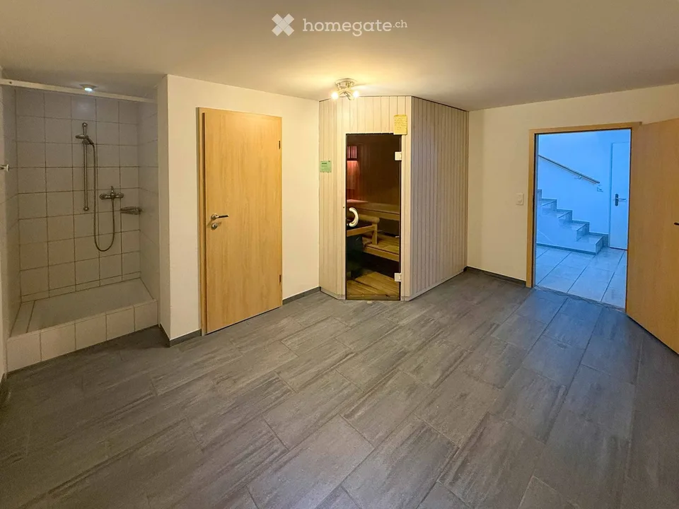 Appartamento di giardino esclusivo 4.5 locali con quattro posti auto, camino e sauna – foto 15 di 20
